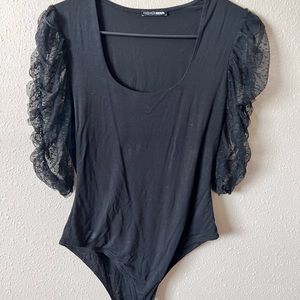 Black ruffle sleeve bodysuit from fashion nova !
